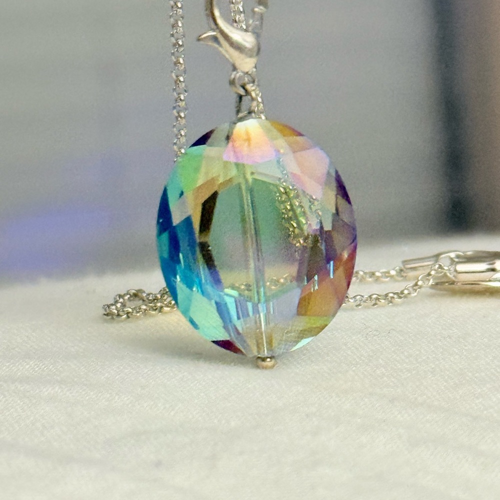 Multi color Iridescent Faceted Crystal Charm/Pendant and silver tone necklace.